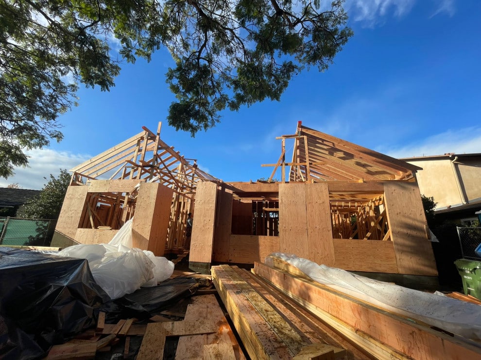 Two-story wood framing of the new Barry Ave home under construction
