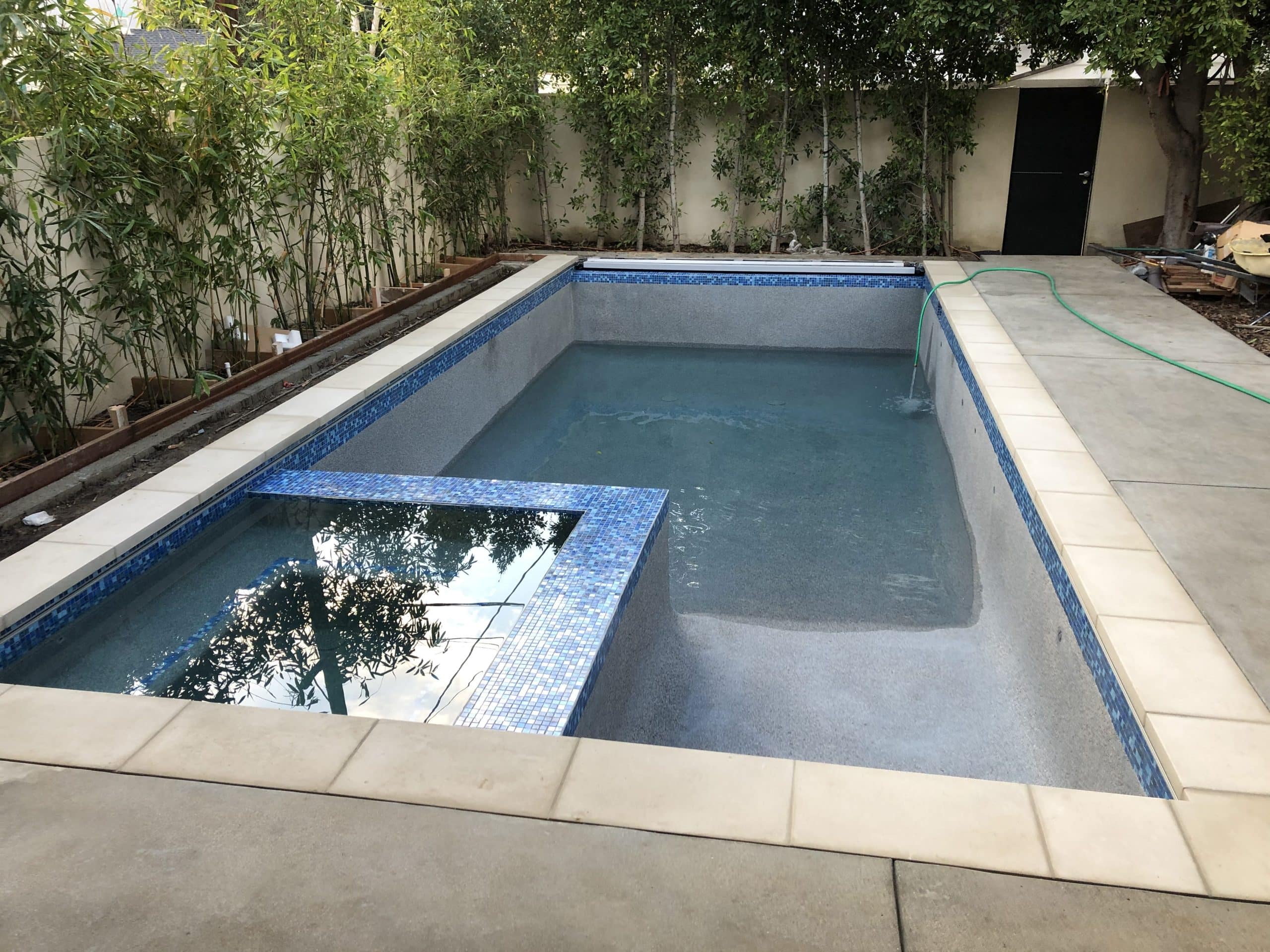 Pool and indoor-outdoor living at the finished Beverly Hills custom home