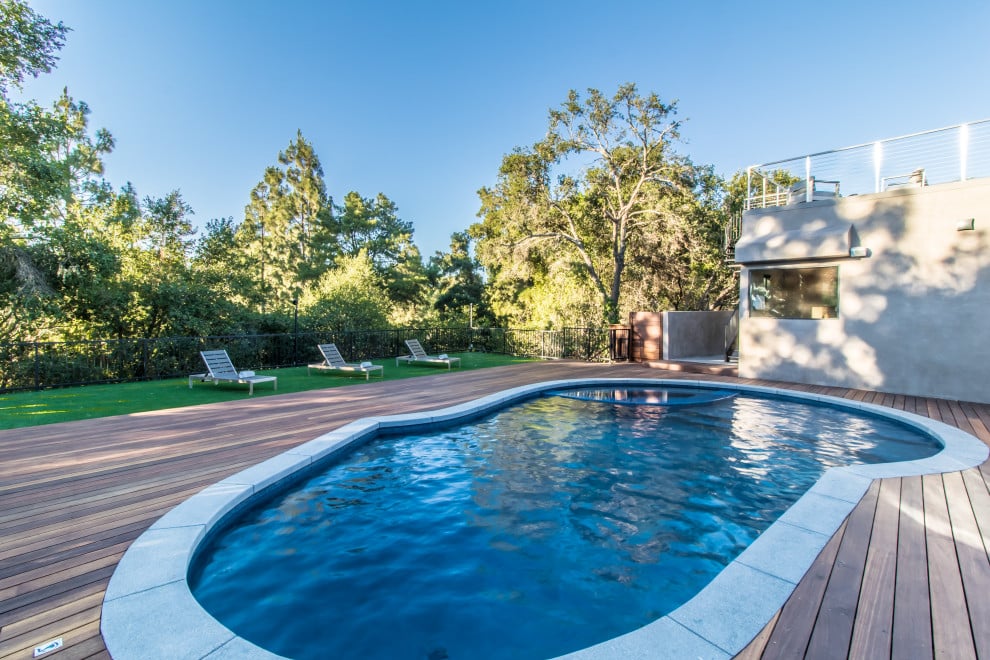 Pool and outdoor living at the finished Dona Lona Dr custom home
