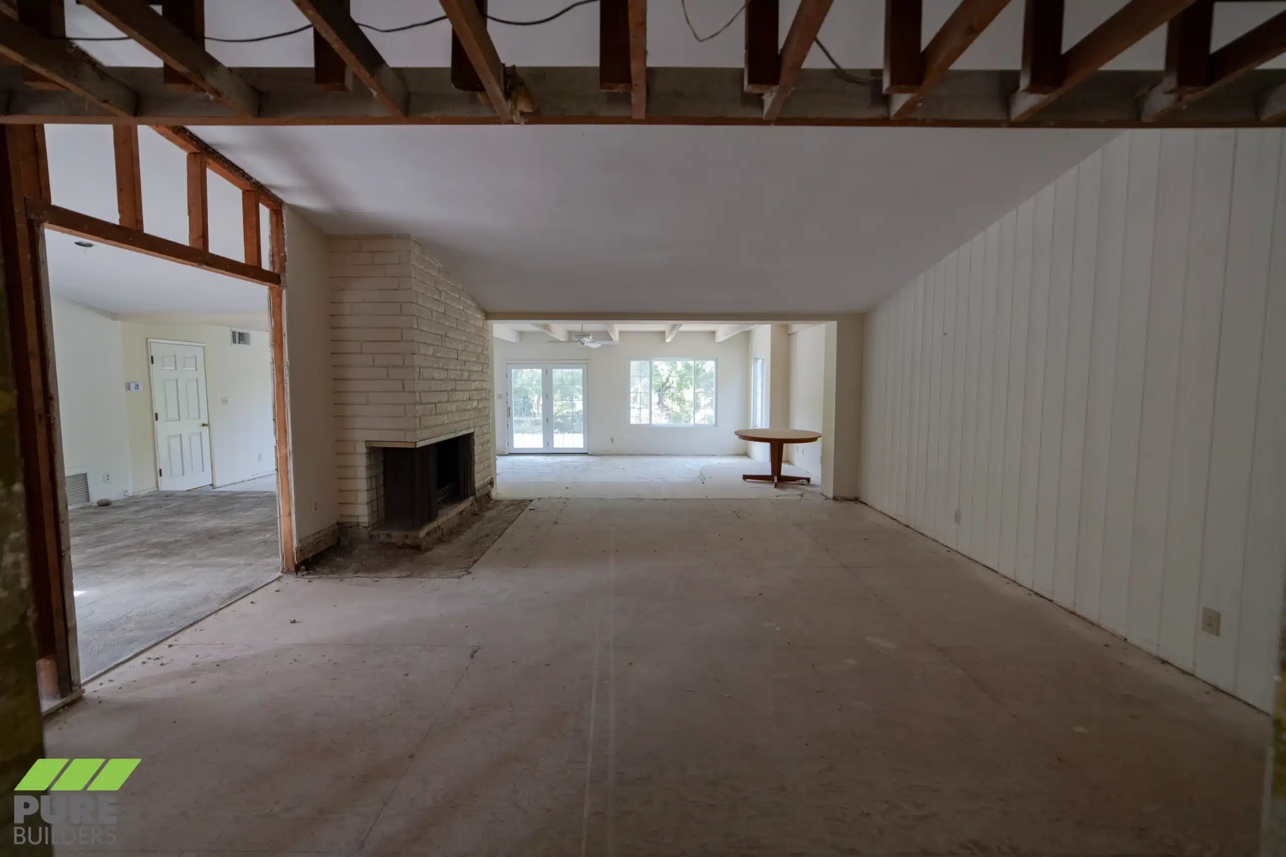 Interior opened up with framing exposed during the remodel